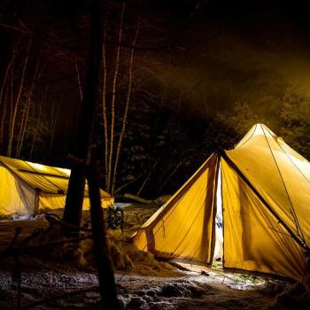 Tents lit up at night