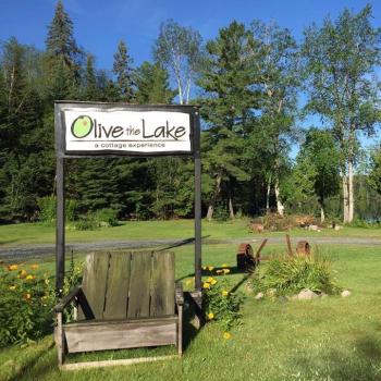 Sign for lodge and outdoor swing