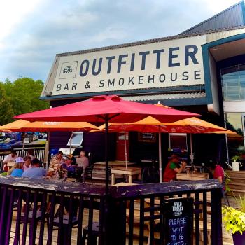 Patio with restaurant sign