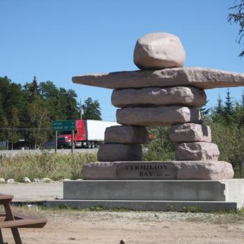 inukshuk on side of highway