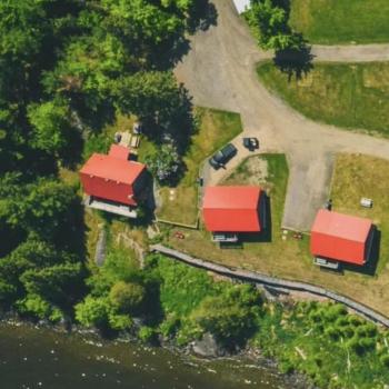 Arial view of cabins by lake