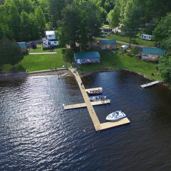 Arial view of cottages and lake front