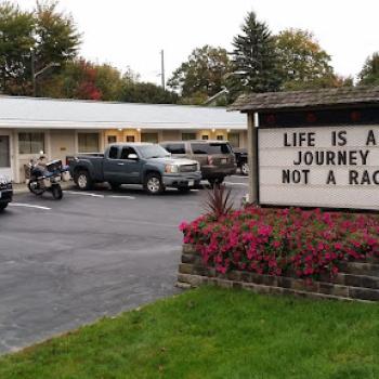 Exterior of Motel with sign