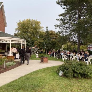 People enjoying food outside of the museum