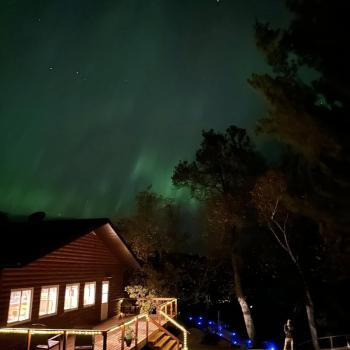 Aurora shining over camp