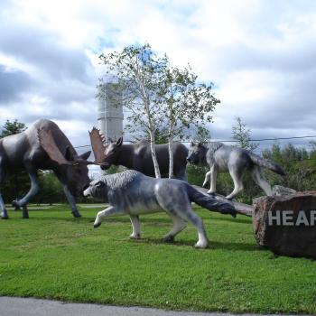Wolves and moose statue