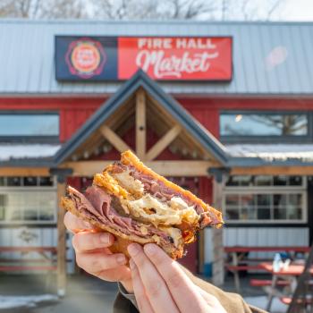 yummy sandwich in front of Port Stanley Firehall Market Port Stanley on Cruise the Coast southwestern Ontario motorcycle touring routes